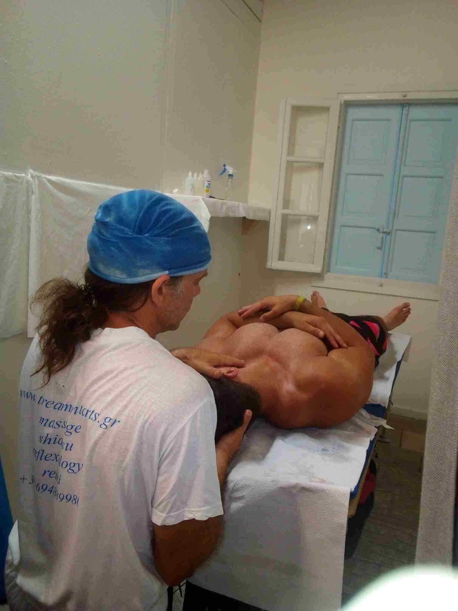 picture of a man getting a neck massage