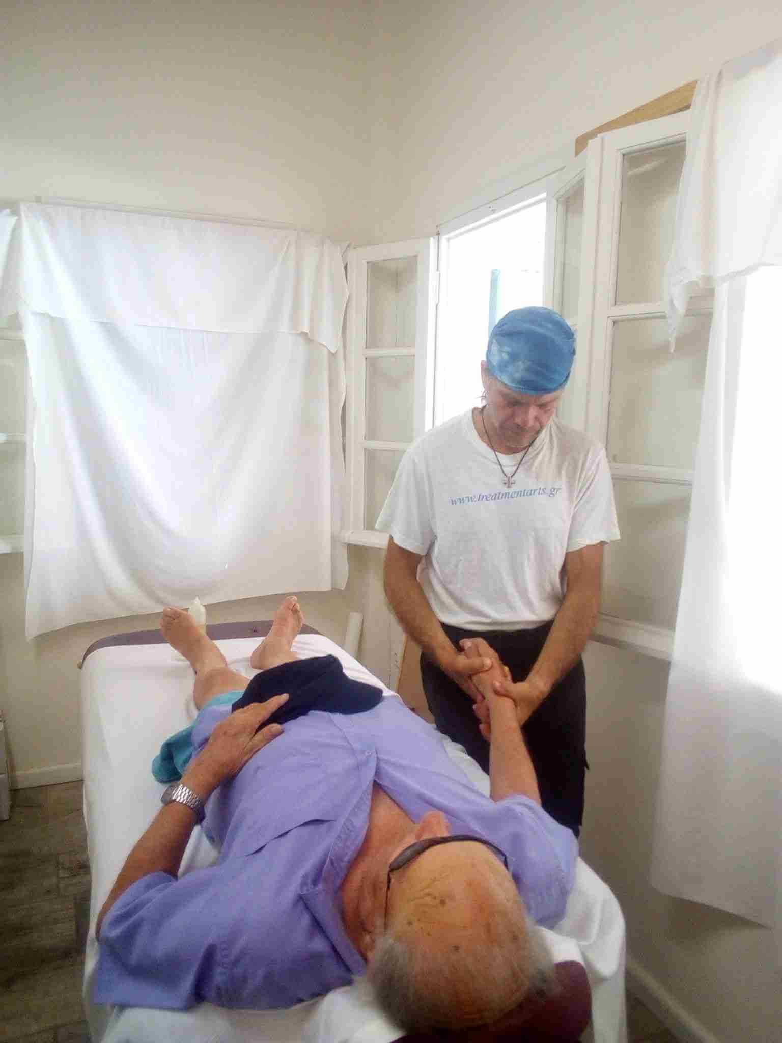 picture of an older gentleman getting a massage